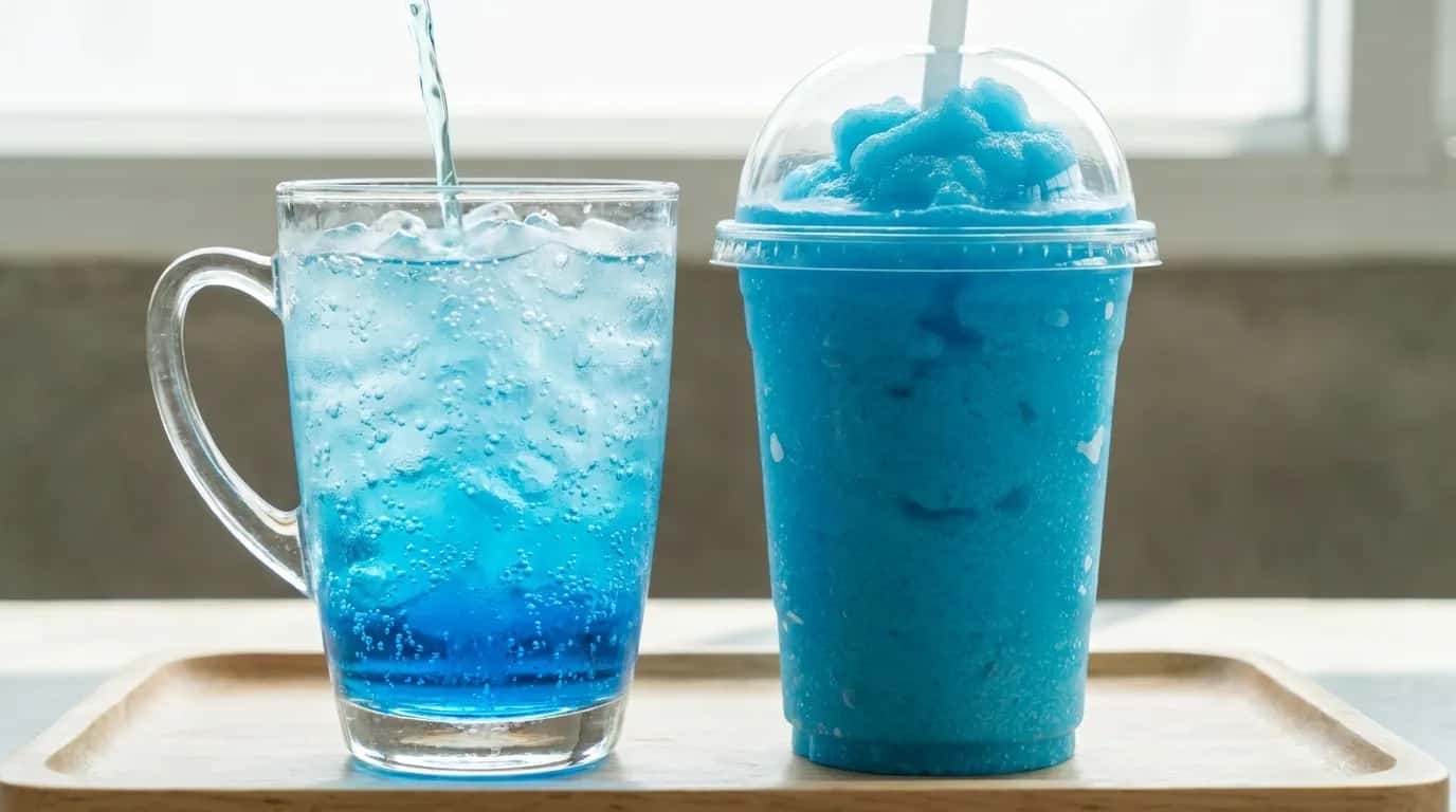 Sonic Ocean Water next to a Blue Coconut Slush, showing the difference between the poured drink and the blended one